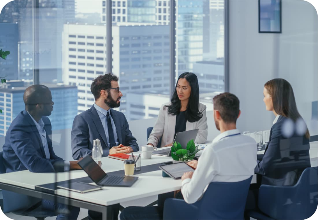 A group of business leaders collaborating around a table